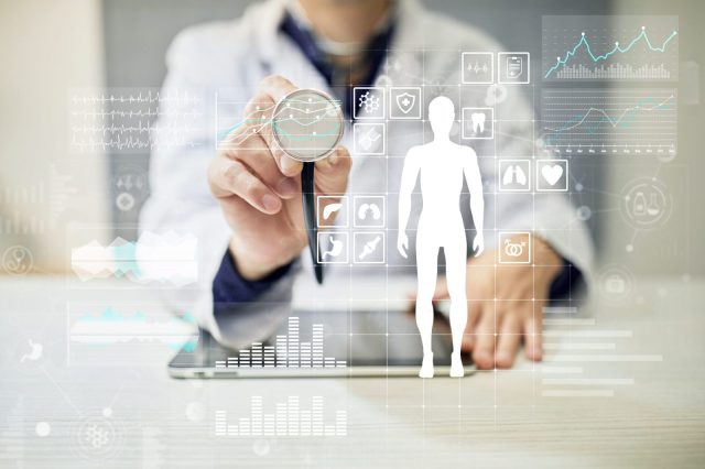 Doctor,Using,Modern,Computer,With,Medical,Record,Diagram,On,Virtual